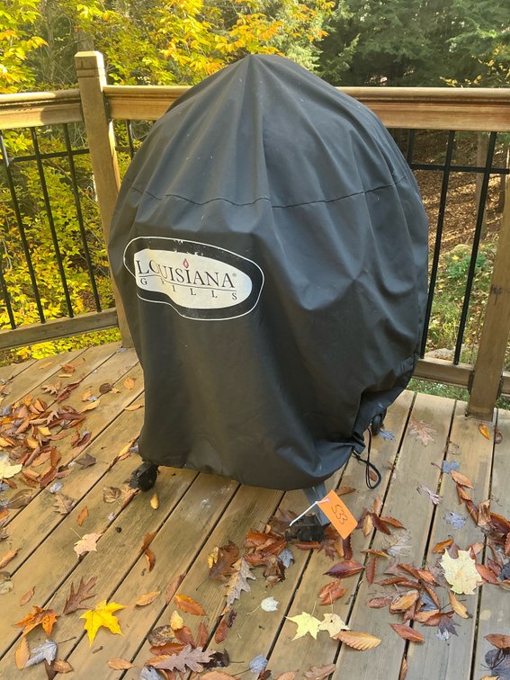 Louisiana Grills red ceramic kamado grill on rolling cart - Deck