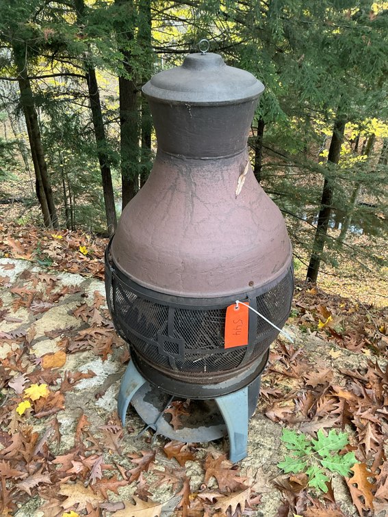 Metal chiminea fire pit with mesh spark screen - Outside