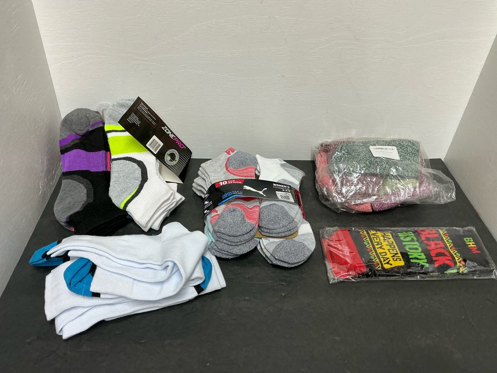 Grouping of assorted athletic and knit socks