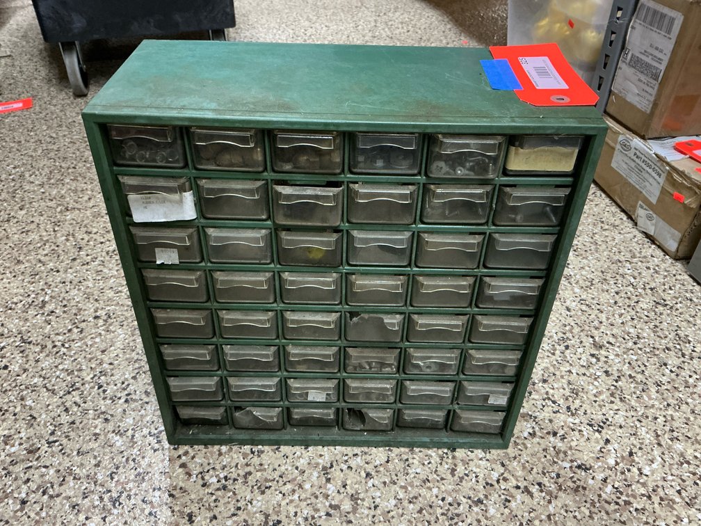 Green metal 48-drawer parts cabinet with hardware