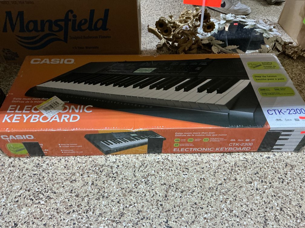 Casio 61-key electronic keyboard with stand