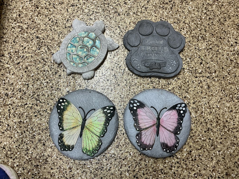 Grouping of decorative garden stepping stones