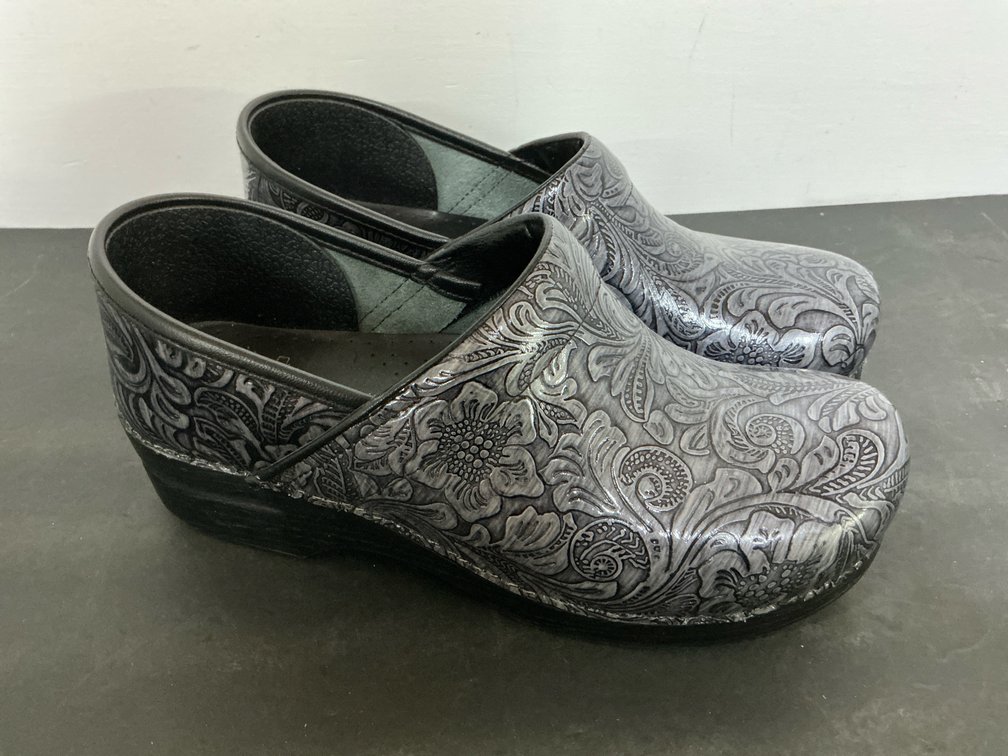 Pair of Dansko floral embossed leather clogs, size 40 Wide