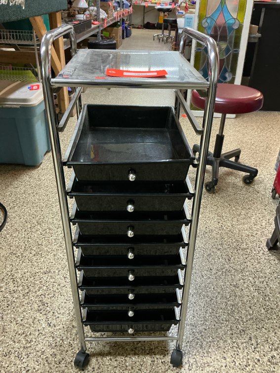 Rolling chrome utility cart with black drawers