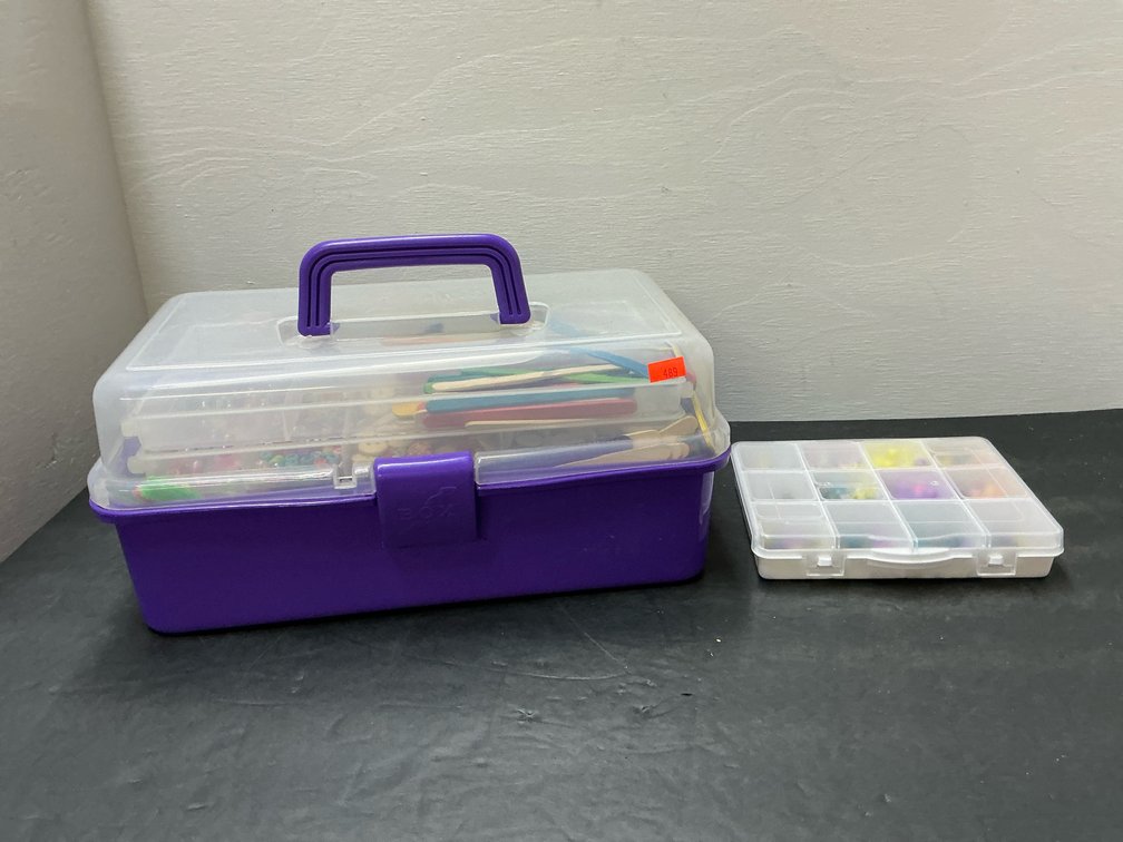 2 plastic craft storage organizers with contents
