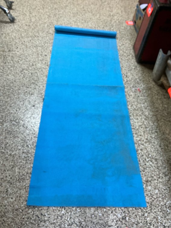 Bright blue foam exercise yoga mat