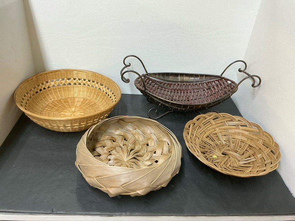 Grouping of woven baskets with metal stand