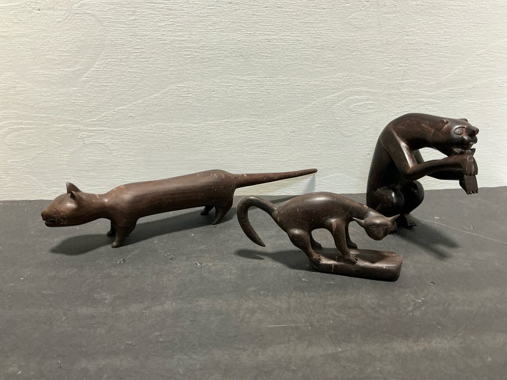 Carved dark wood animal figurines
