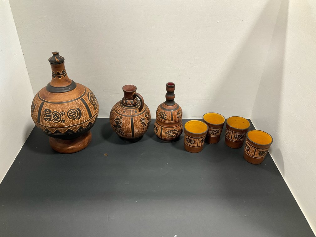 Carved terracotta pottery set