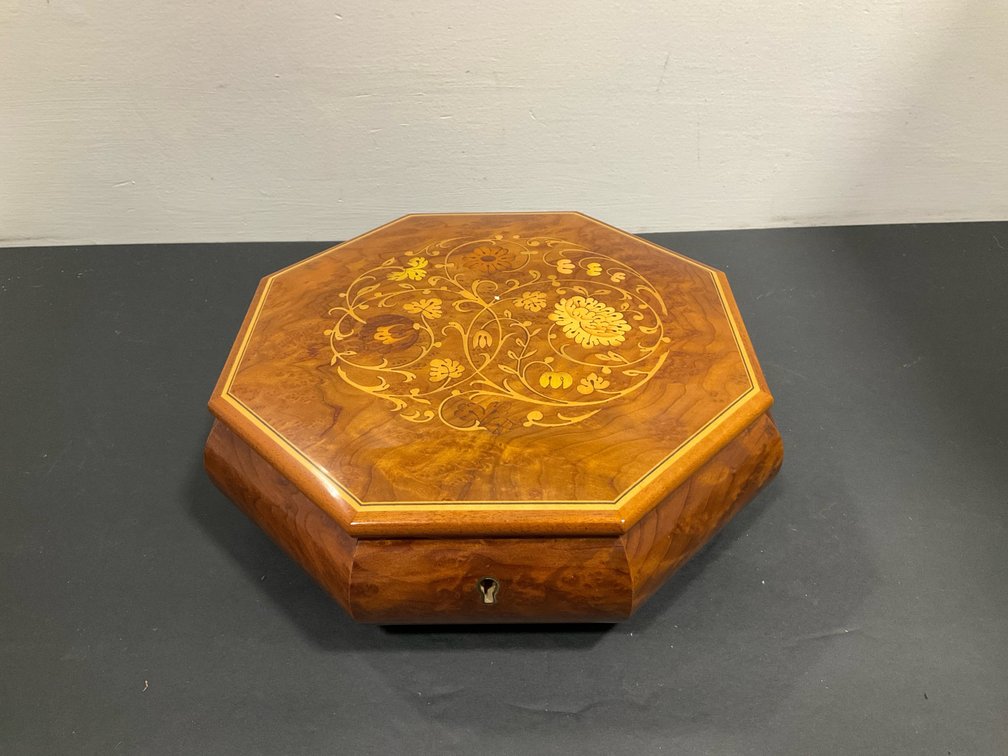 Octagonal burl wood music box with floral marquetry inlay