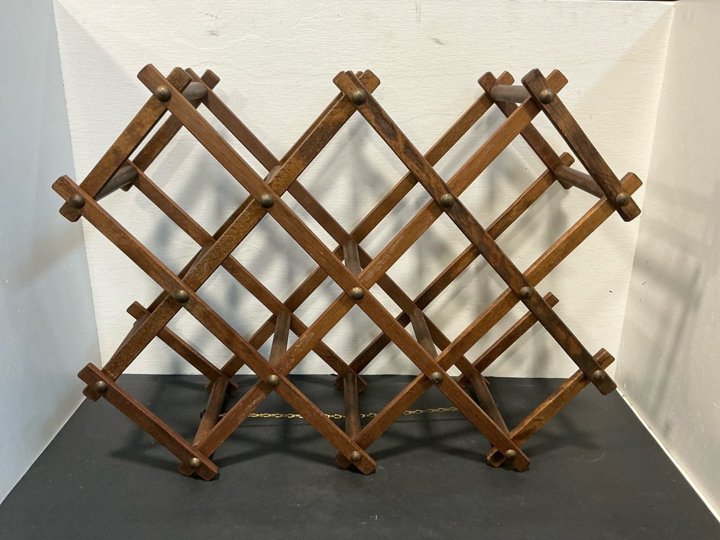 Folding wooden accordion-style wine rack