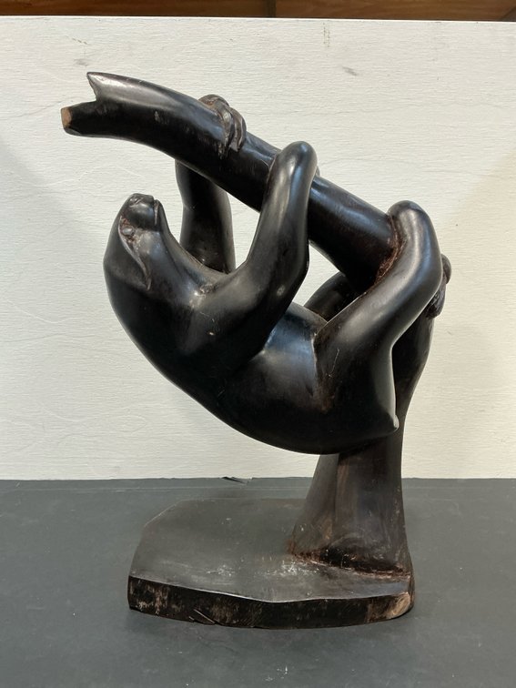 Carved wood animal sculpture