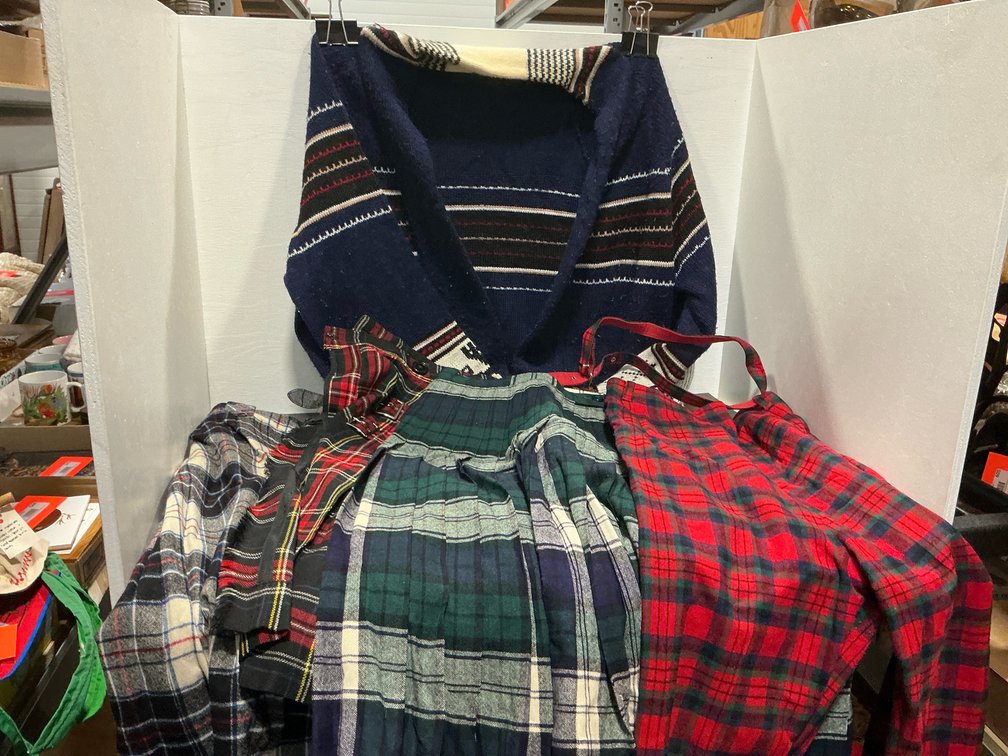 Grouping of plaid skirts, trousers & knit cardigan