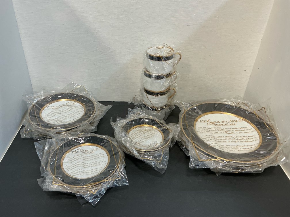 Fitz & Floyd porcelain dinnerware with wire caddies
