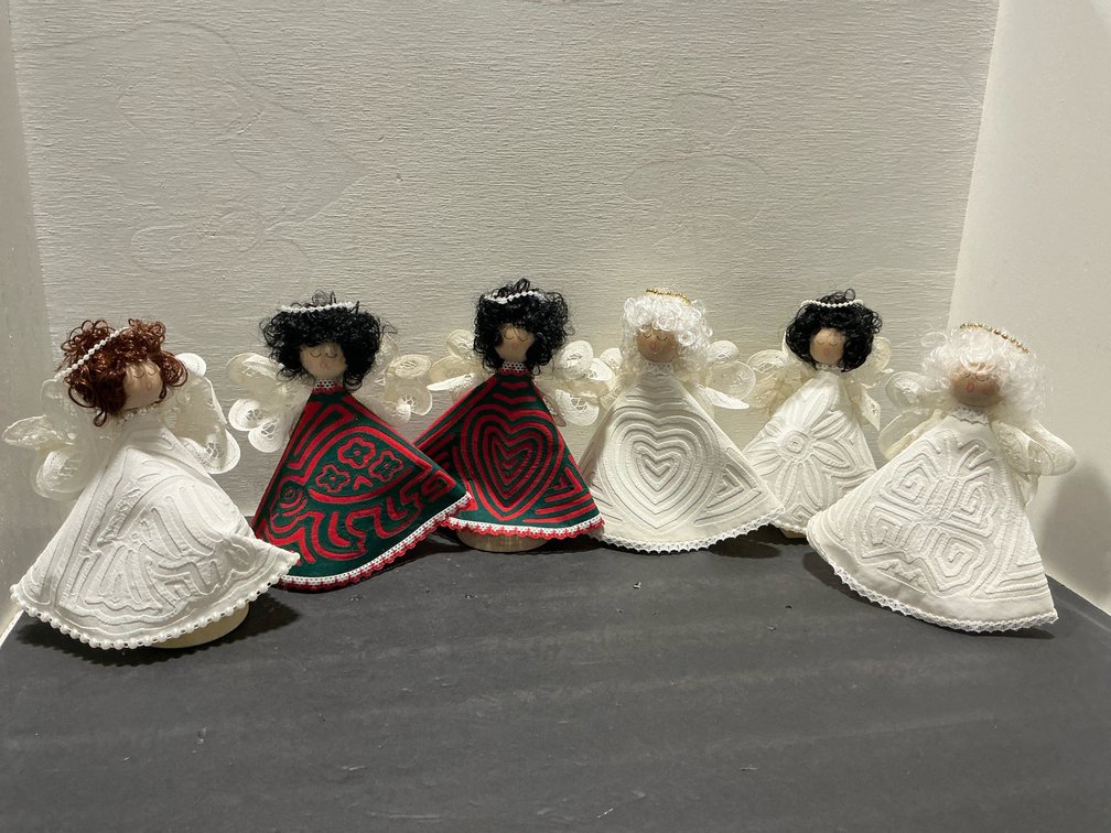Handcrafted fabric angel figurines with lace wings