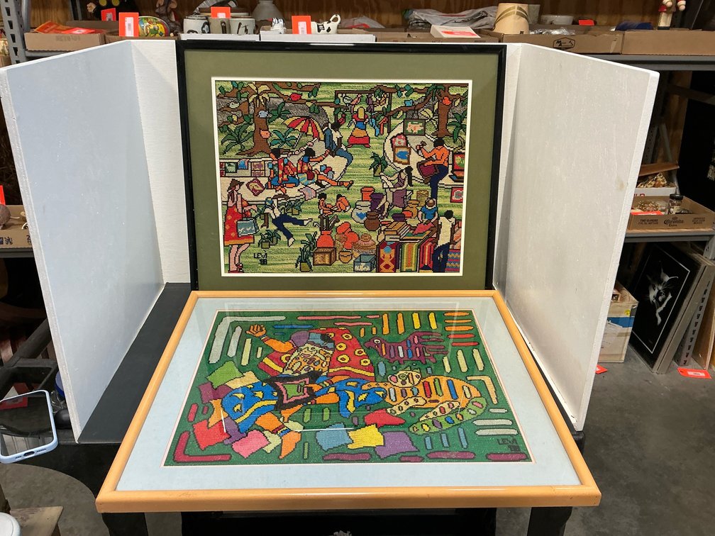 Pair of framed Levi needlepoint artworks