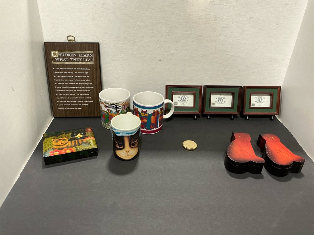 Assorted home decor with frames, boxes, mugs & plaque