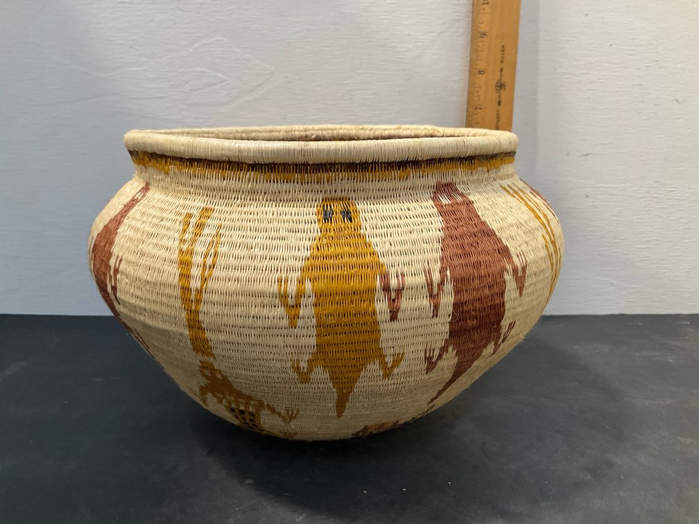 Coiled woven basket with lizard & cactus motifs