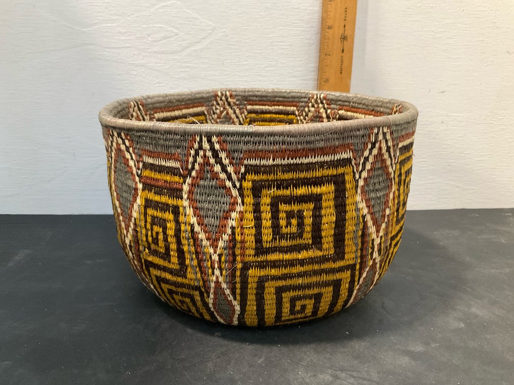 Coiled woven basket bowl with geometric fret design