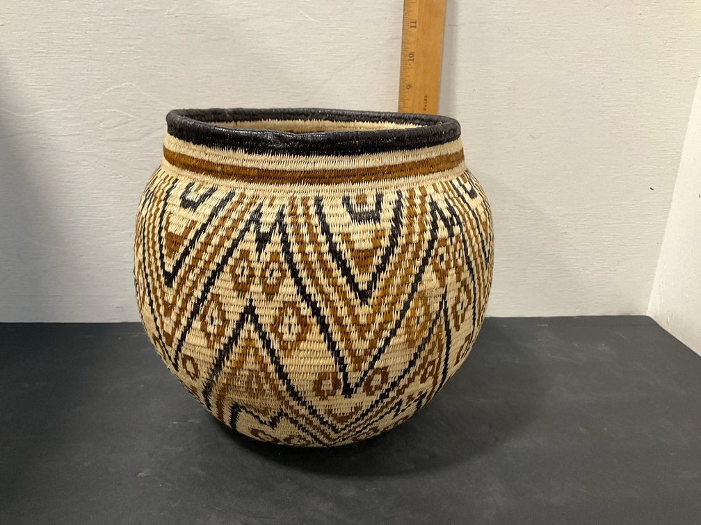 Woven coiled basket jar with geometric chevron pattern