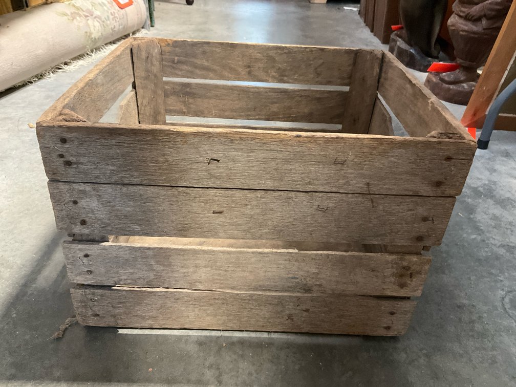 Wooden slatted crate with cutout handles