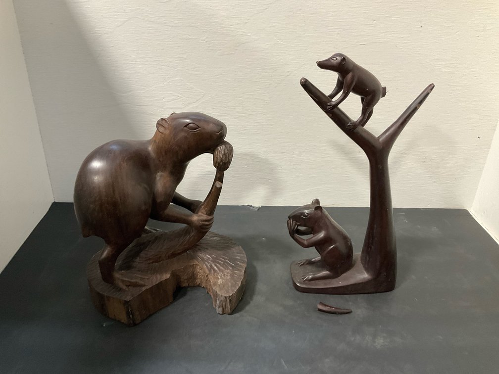 Pair of carved wood animal sculptures