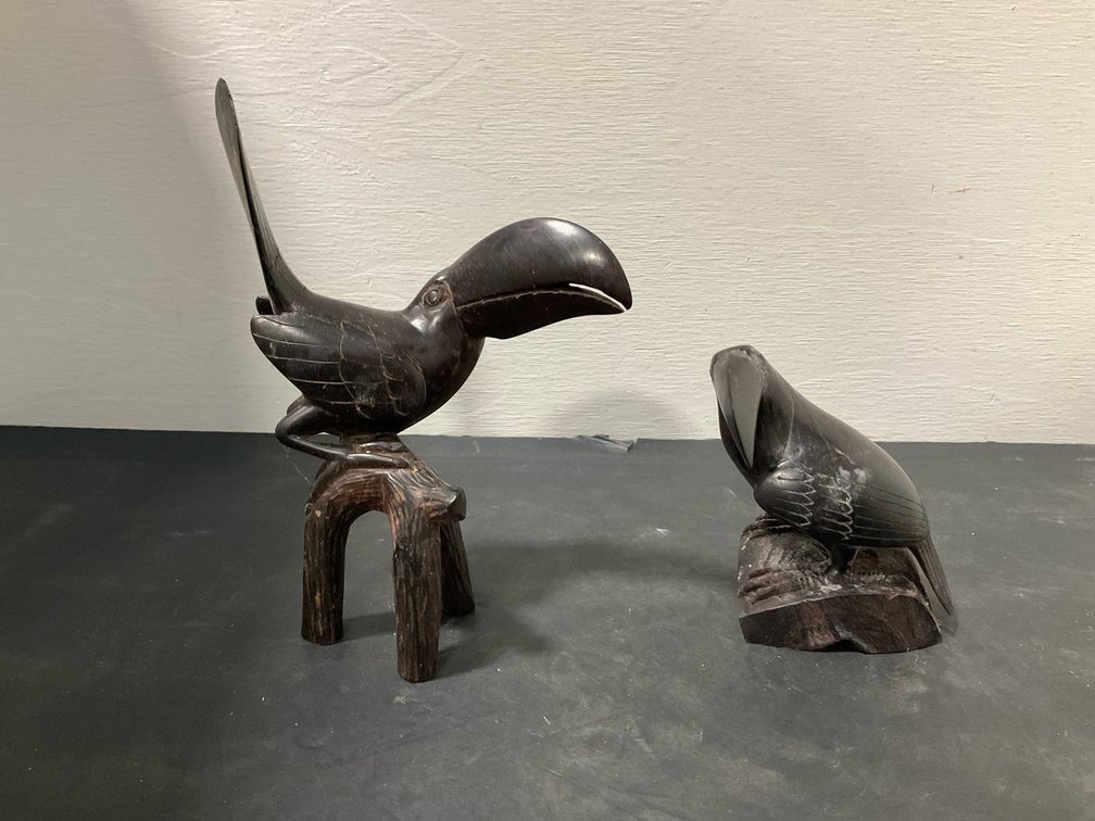 Pair of carved dark wood toucan figurines