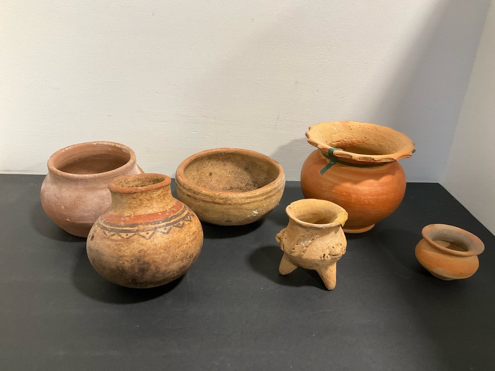 Grouping of terracotta pottery vessels