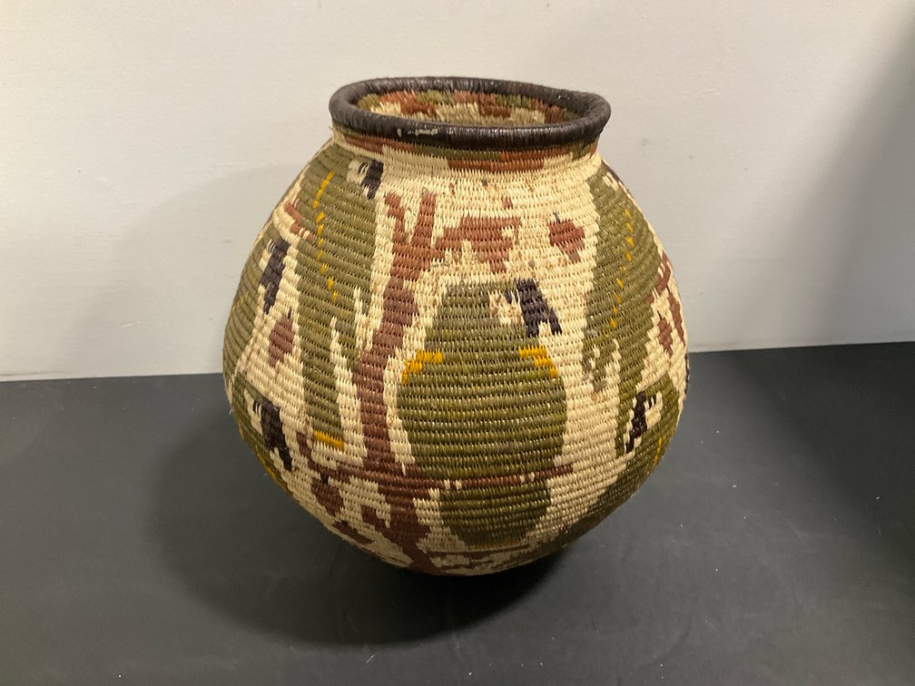 Coiled woven basket with landscape & tree motifs
