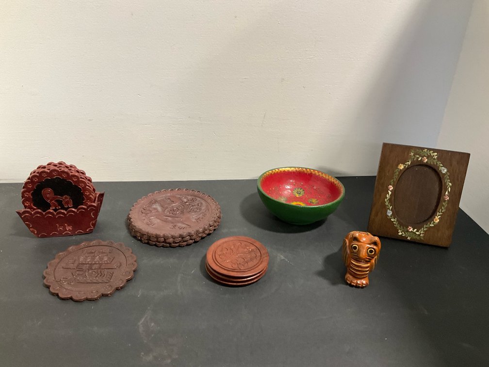 Grouping of folk art coasters, bowl, frame & whistles