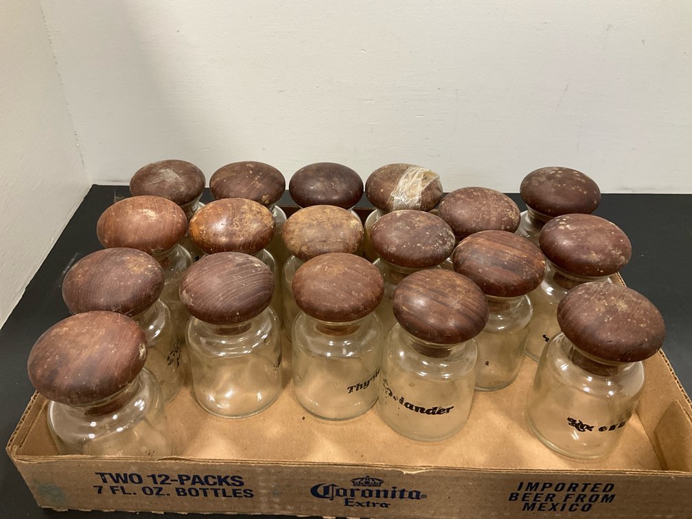 Glass spice jars with wooden ball stoppers