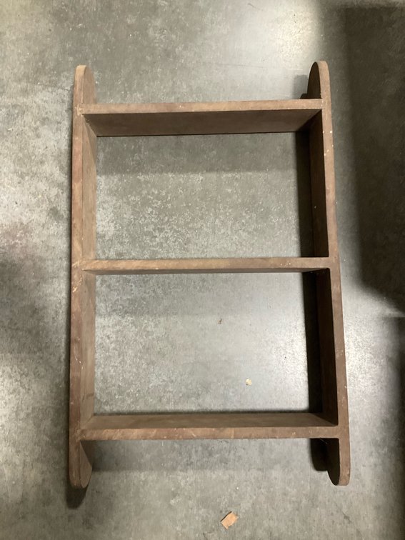 Brown wooden two-tier shelf with rounded uprights