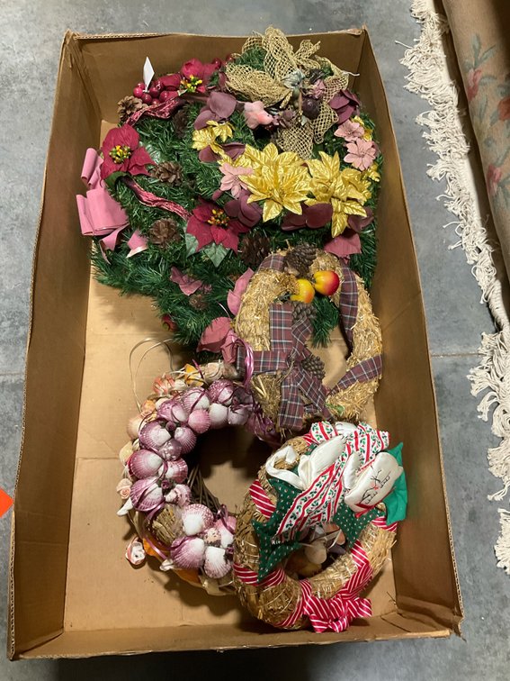 Grouping of decorative holiday & seashell wreaths