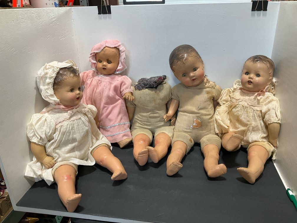 Composition baby dolls with cloth bodies