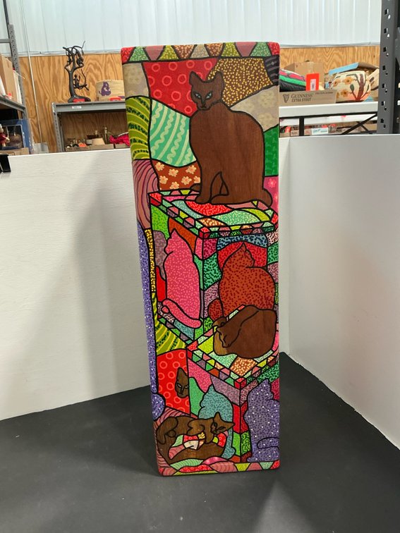 Hand-painted wooden pedestal with cat motifs