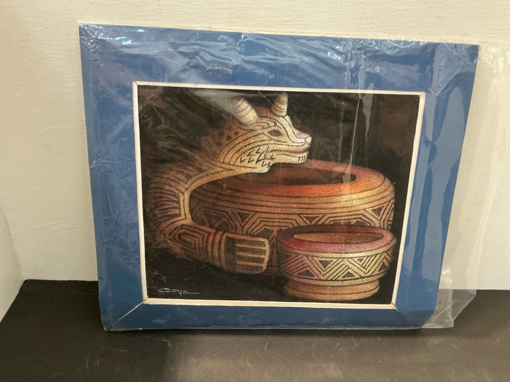 Matted patterned horned creature and vessels artwork