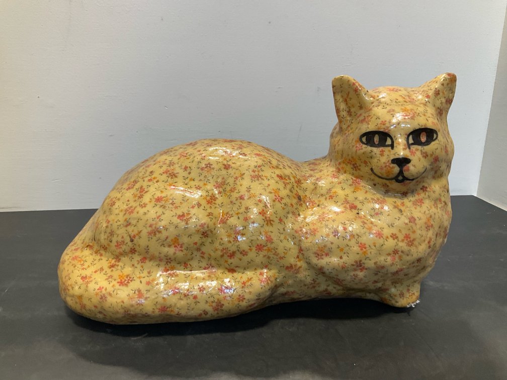Yellow floral chintz reclining cat figurine