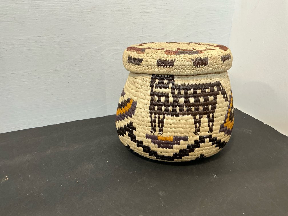 Oval coiled woven fiber basket with lid