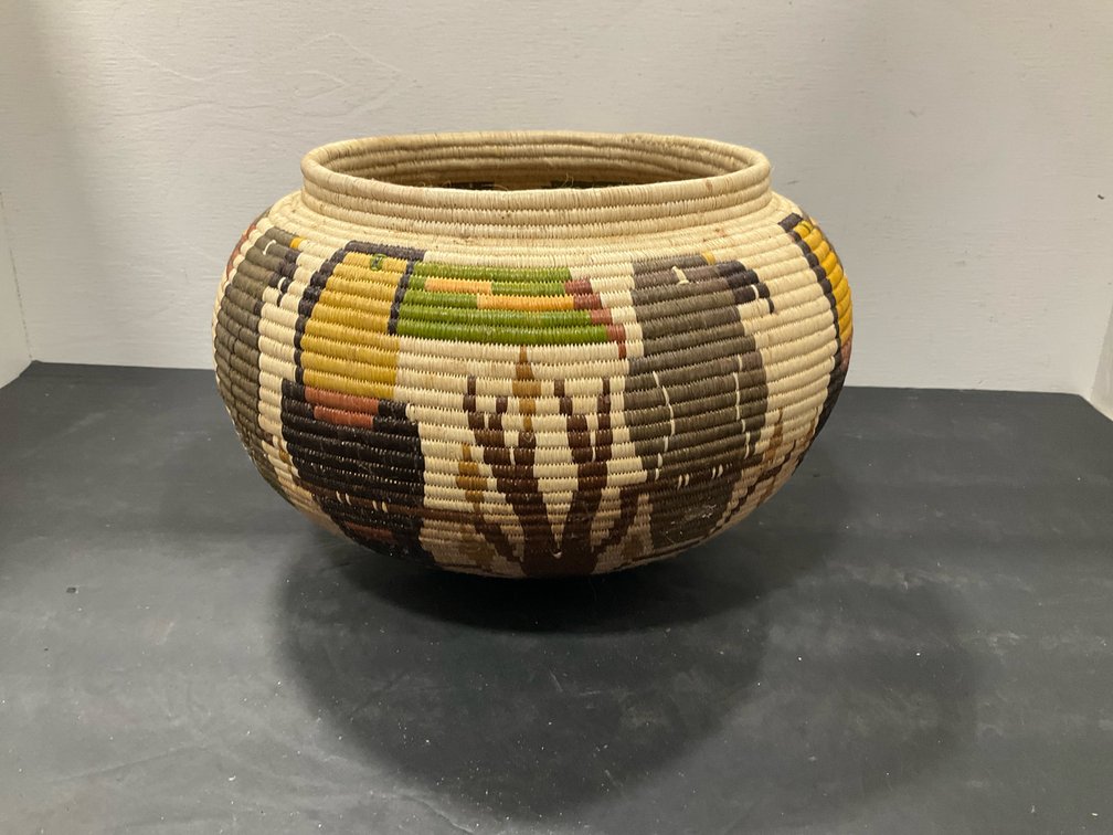 Polychrome coiled woven basket with bird & cactus motifs