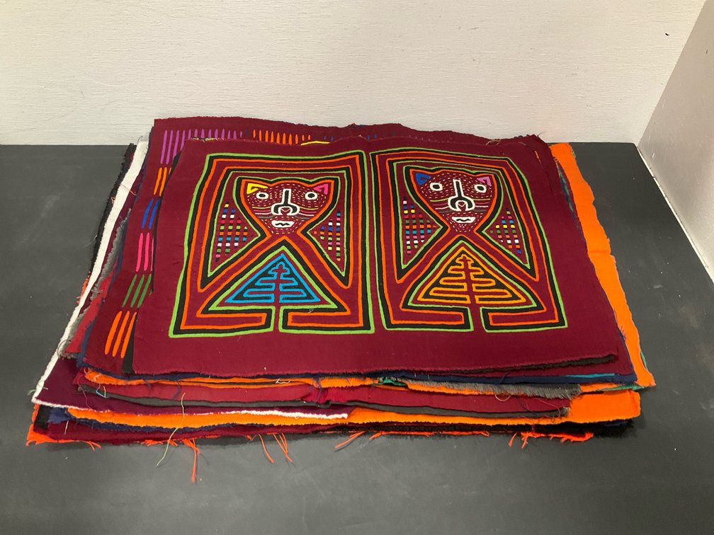 Grouping of mola reverse-appliqué textile panels