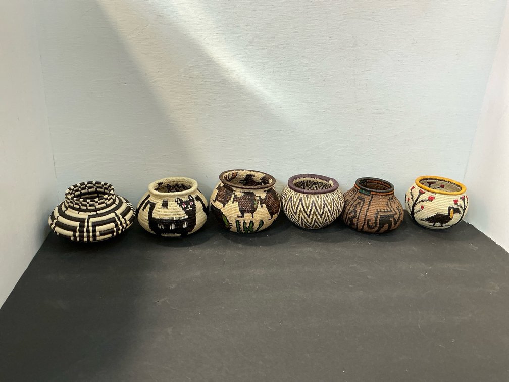 Miniature coiled woven fiber baskets