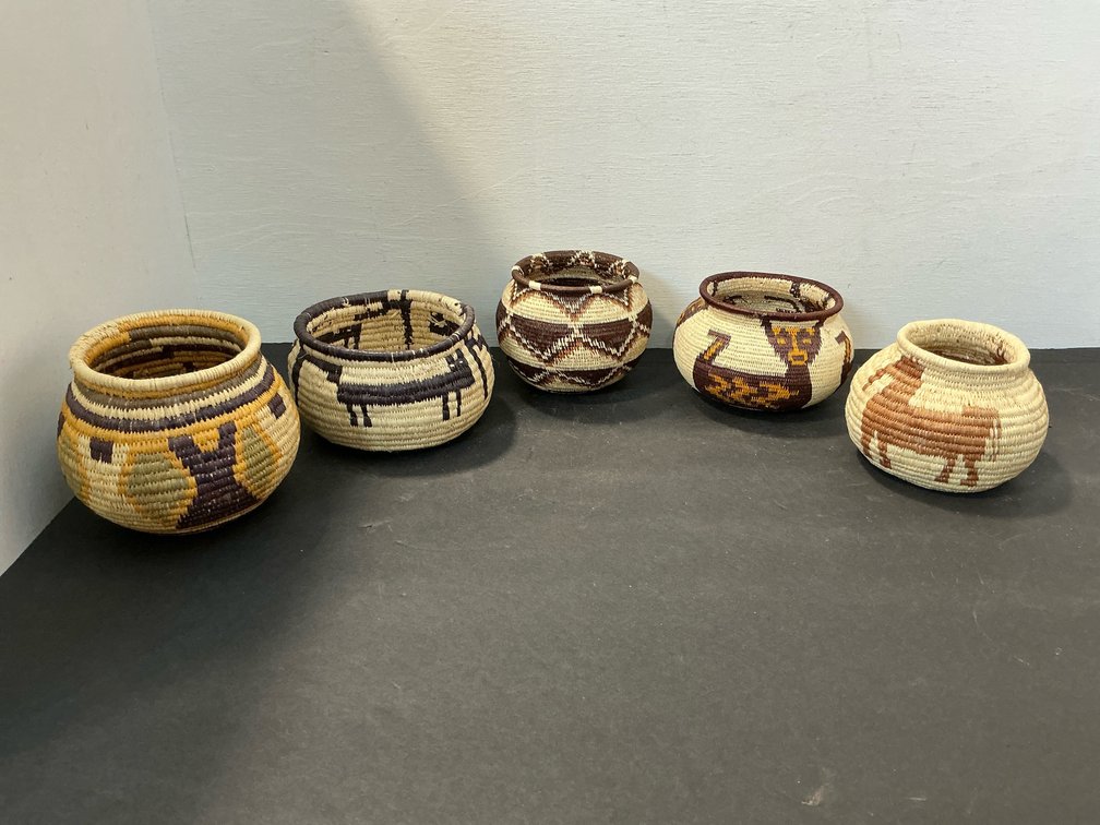 Coiled woven baskets with animal & geometric motifs