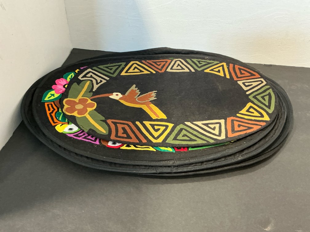 Assorted black embroidered bird & floral placemats