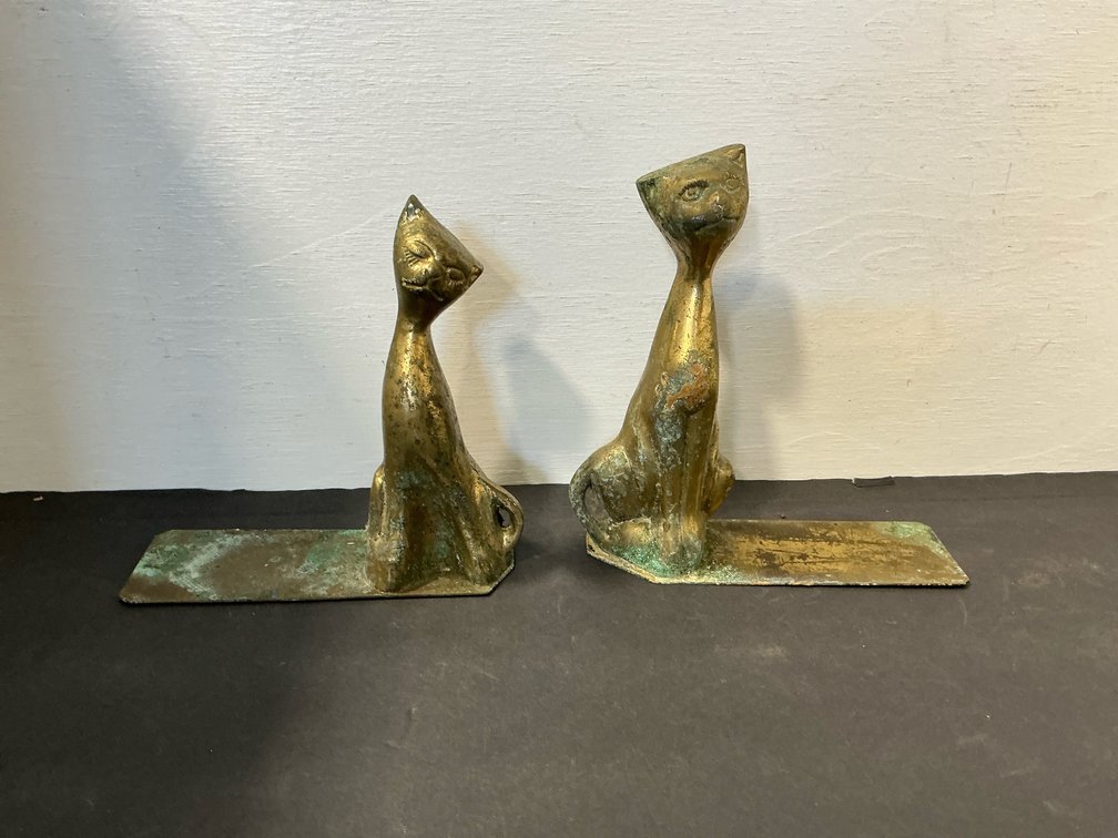 Pair of cast brass stylized cat bookends
