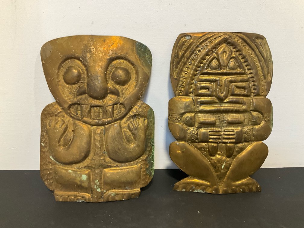 Pair of Pre-Columbian style repoussé brass plaques
