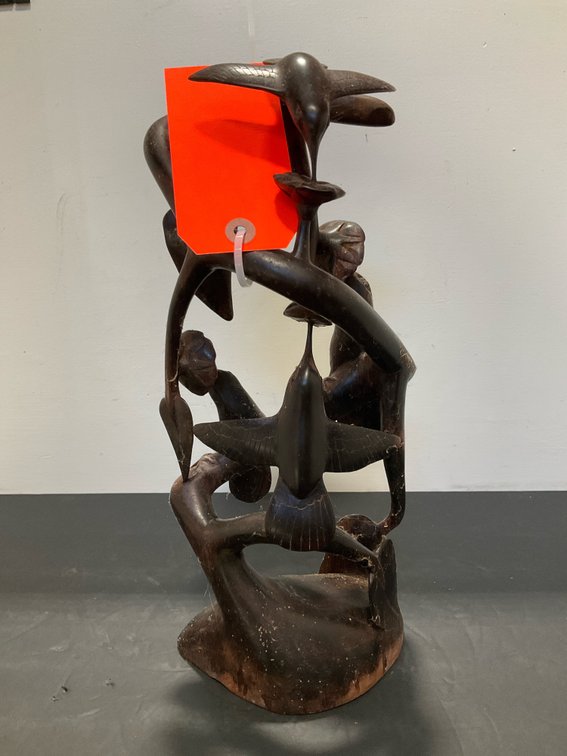 Carved wood hummingbird and flower sculpture