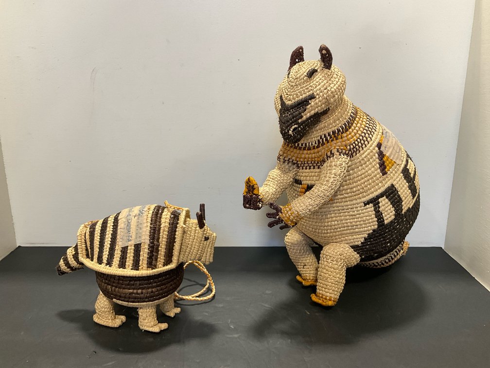 Pair of woven fiber animal effigy figures