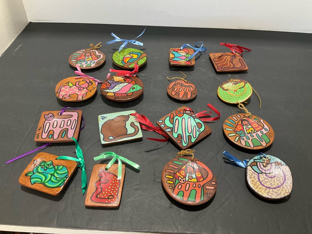 Grouping of hand-painted wooden hanging ornaments