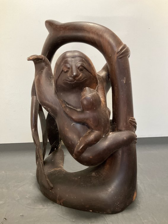 Carved dark wood sloth & baby sculpture