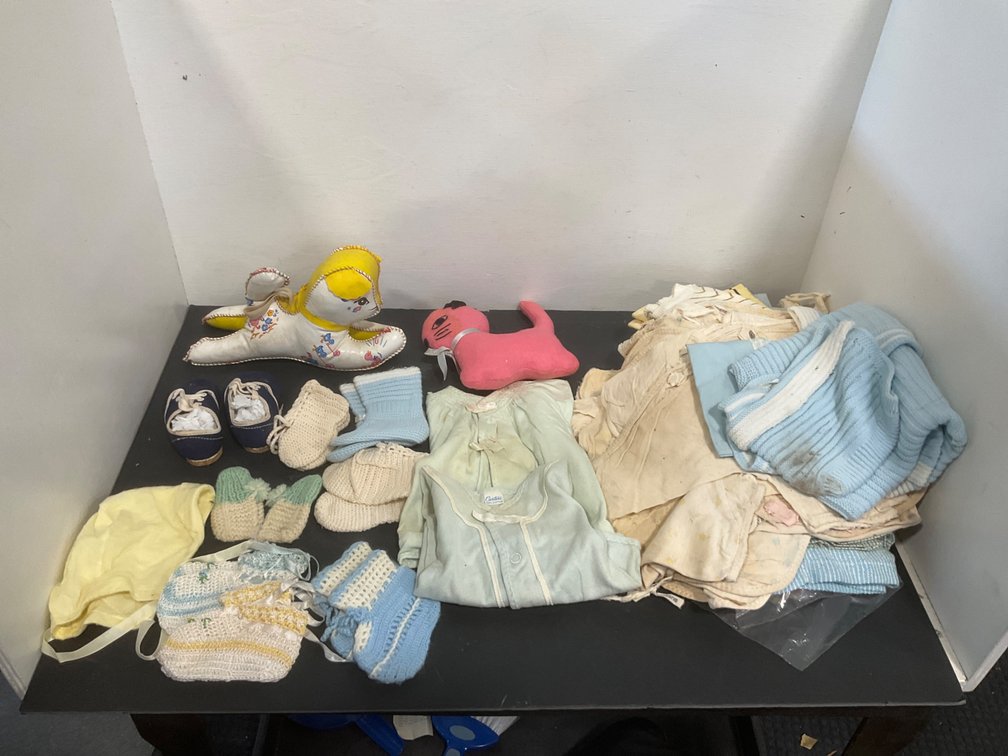 Grouping of infant clothing, booties & plush toys